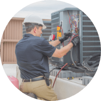 hvac worker fixing HVAC unit