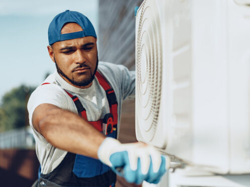 rsz young black man repairman checking an outside air 2023 11 27 05 22 22 utc